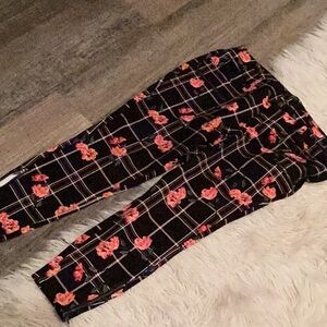 Torrid women’s Black and Red Floral Plaid Jeans with zip pockets size 12